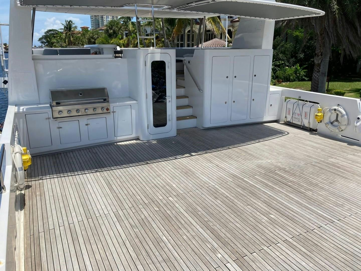 a large white and grey outdoor kitchen aboard SAMSARA Yacht for Sale