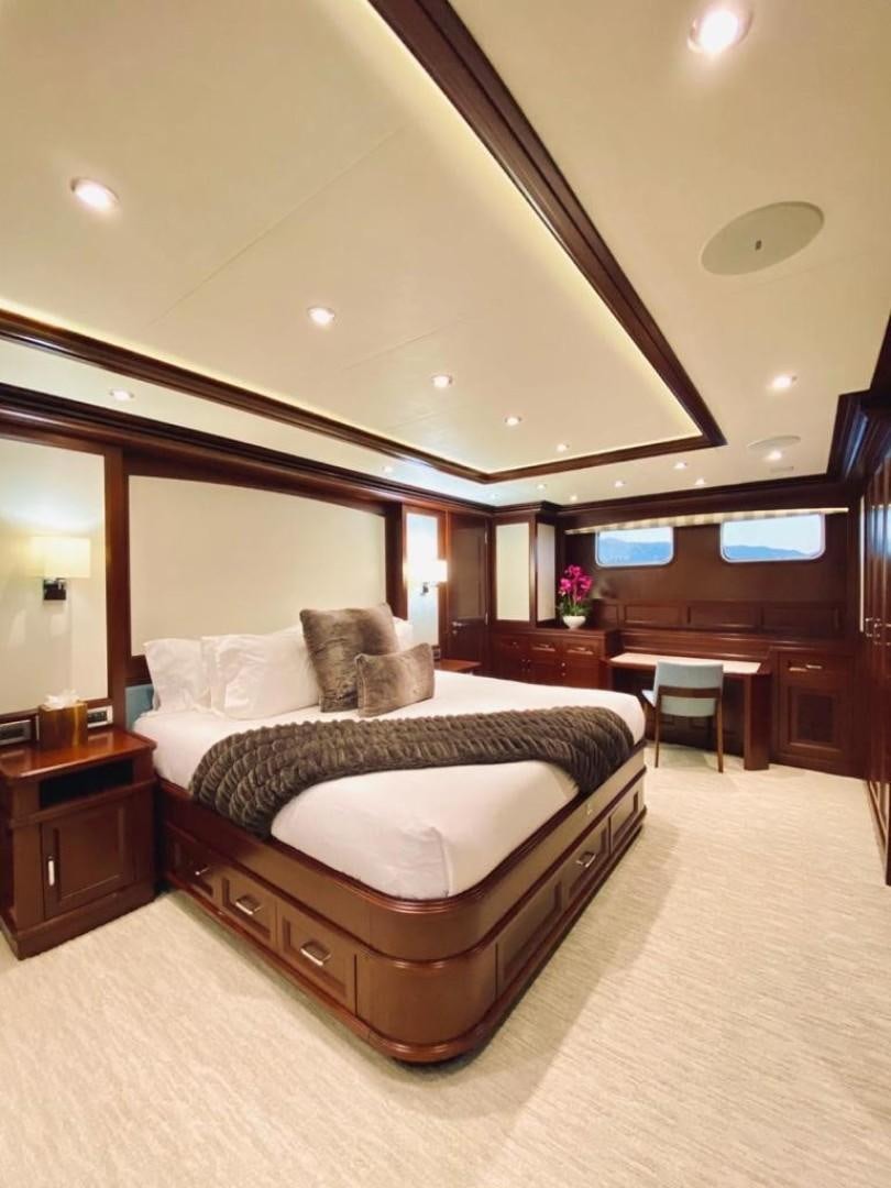a bed in a hotel room aboard SAMSARA Yacht for Sale