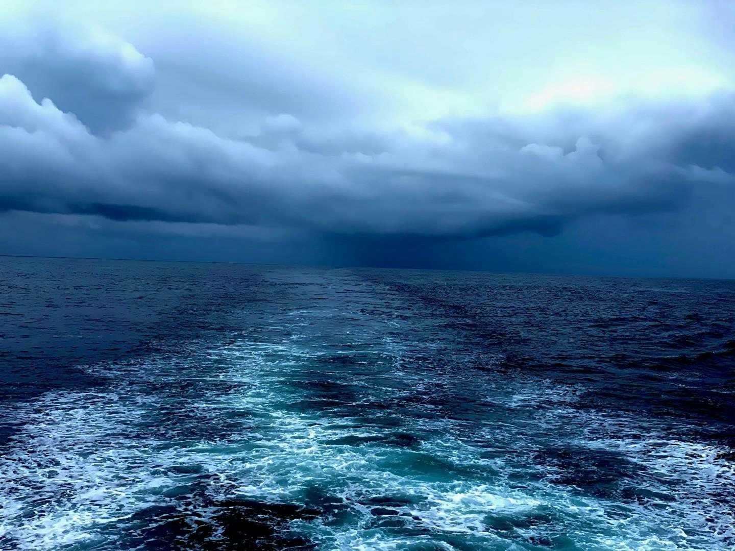 a body of water with clouds in the sky aboard SAMSARA Yacht for Sale