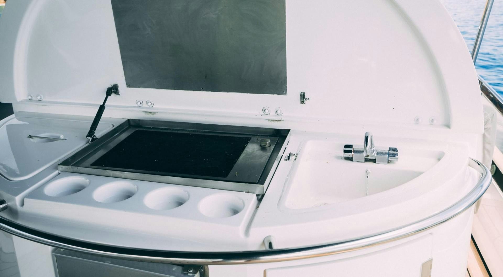 a white microwave oven aboard LUCKY Yacht for Sale