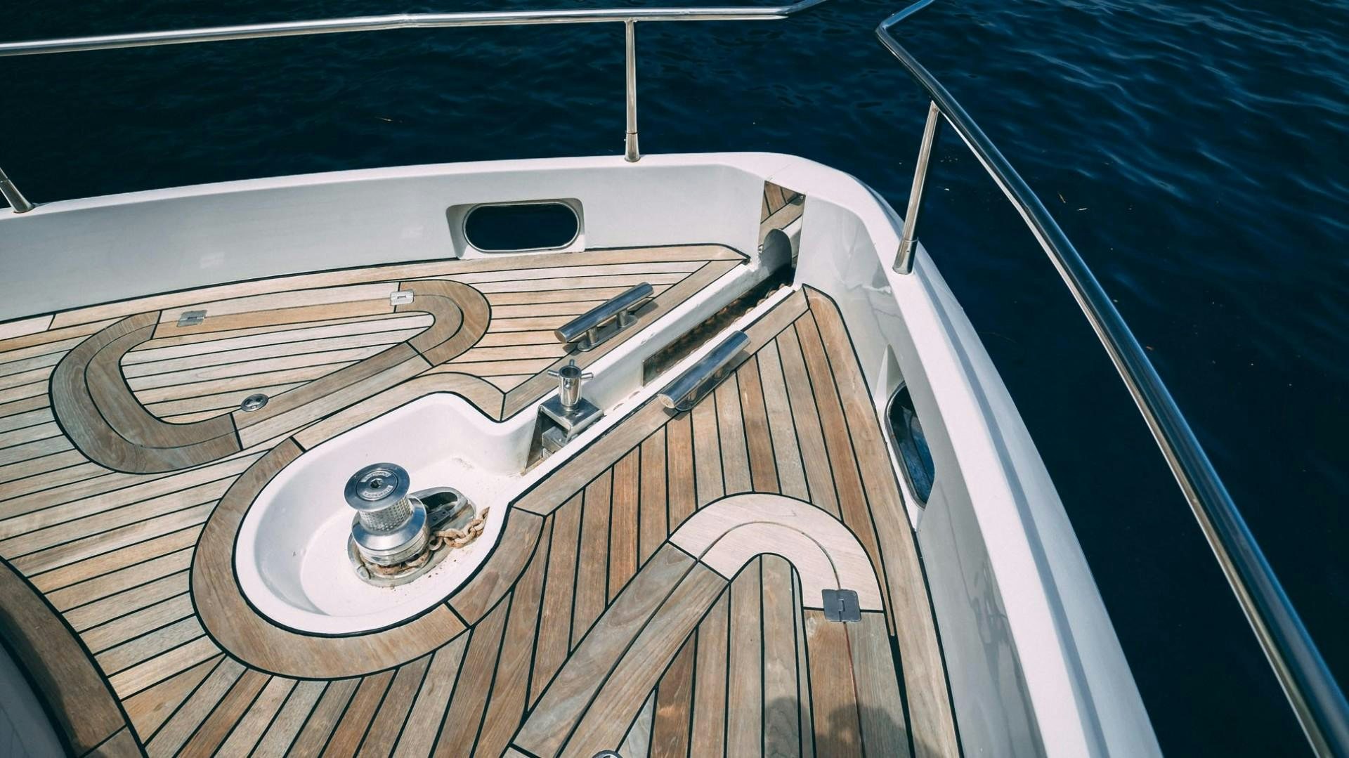 a wooden boat on the water aboard LUCKY Yacht for Sale