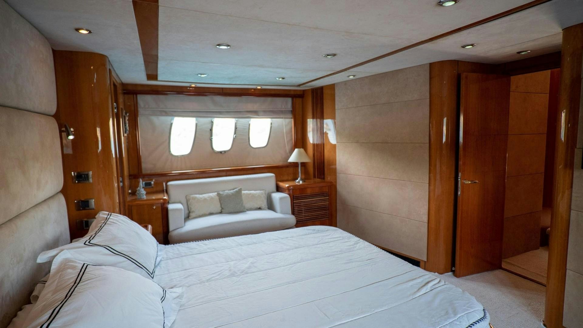 a bed in a room aboard LUCKY Yacht for Sale
