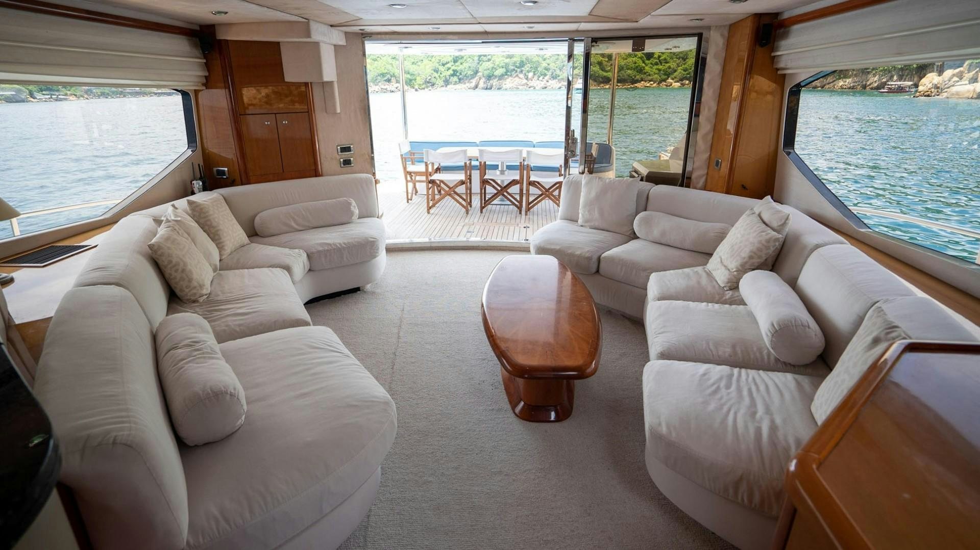 a living room with a large window aboard LUCKY Yacht for Sale