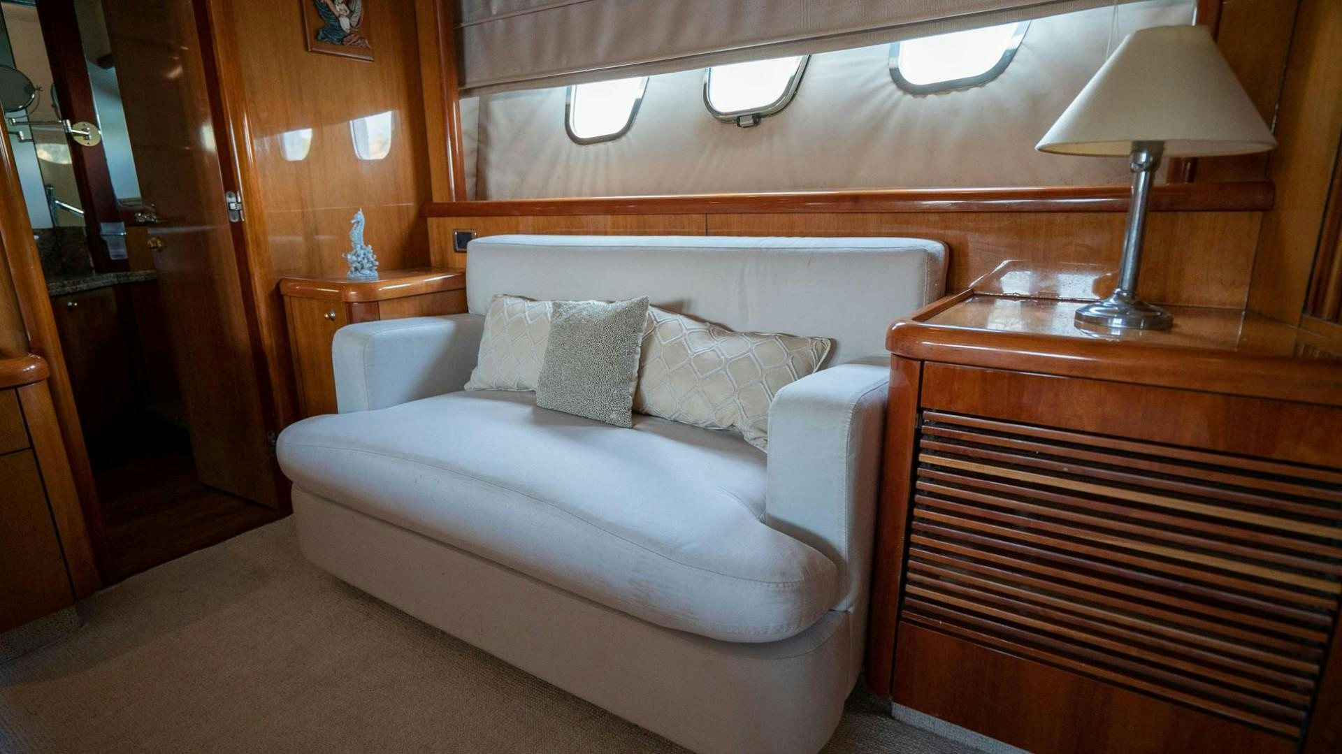 a bed in a room aboard LUCKY Yacht for Sale