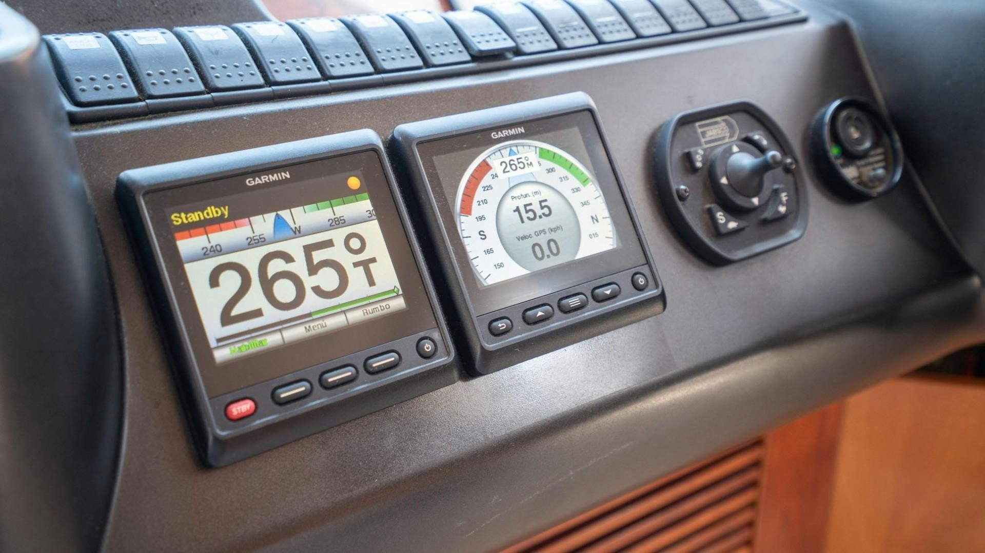 a couple of cell phones on a table aboard LUCKY Yacht for Sale