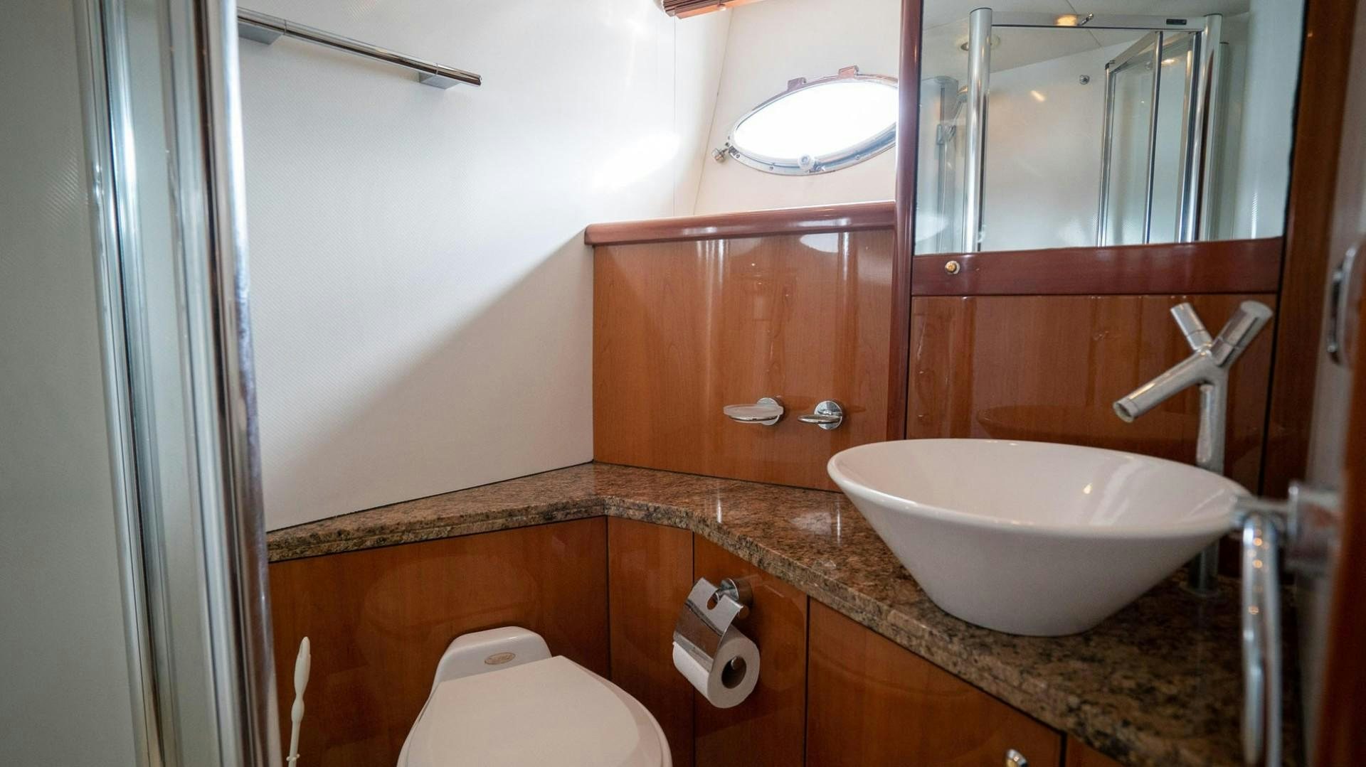 a bathroom with a sink and a toilet aboard LUCKY Yacht for Sale