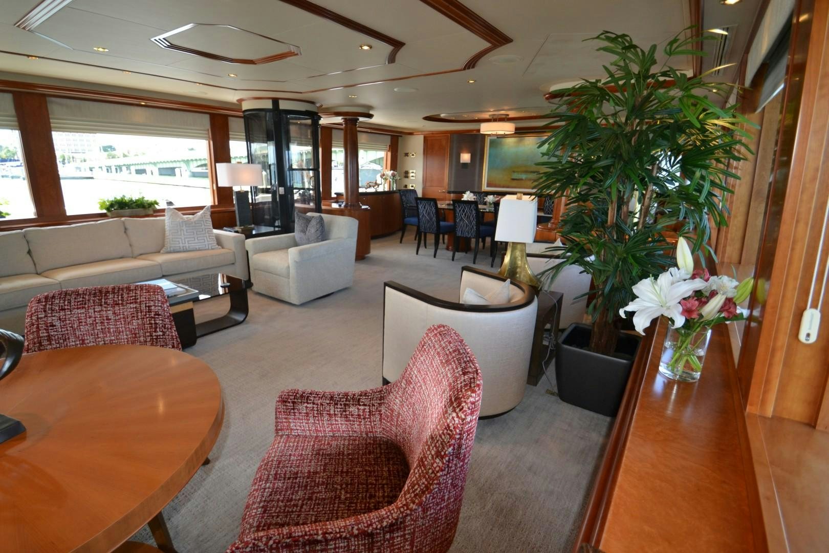 a living room with a plant in it aboard REBELLIOUS Yacht for Sale