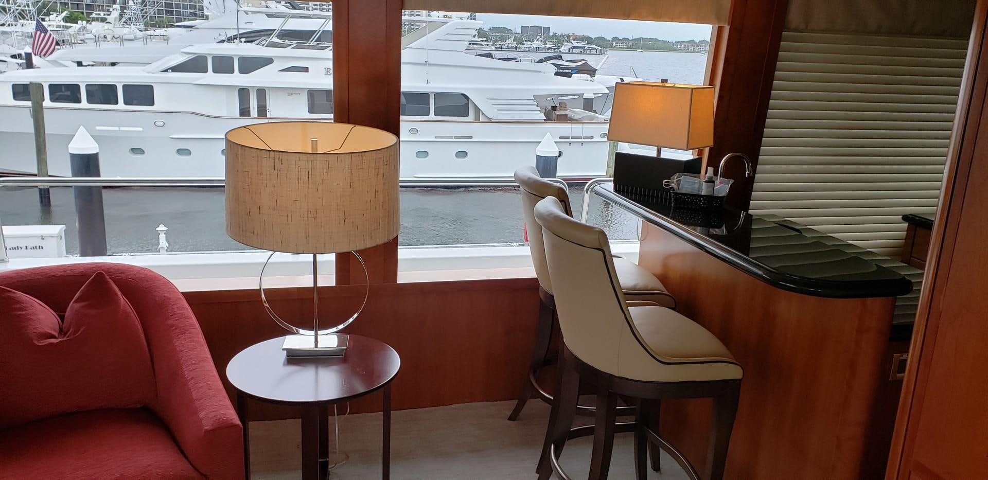 a lamp on a table aboard REBELLIOUS Yacht for Sale