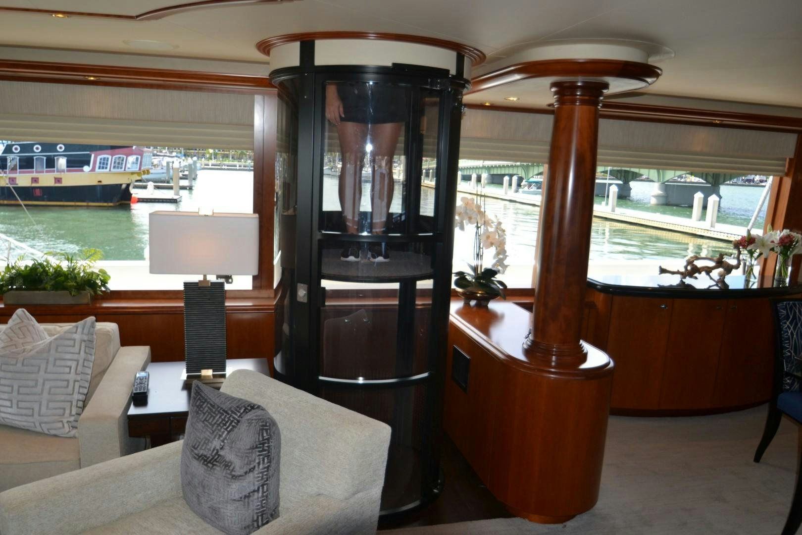 a room with a table and chairs aboard REBELLIOUS Yacht for Sale