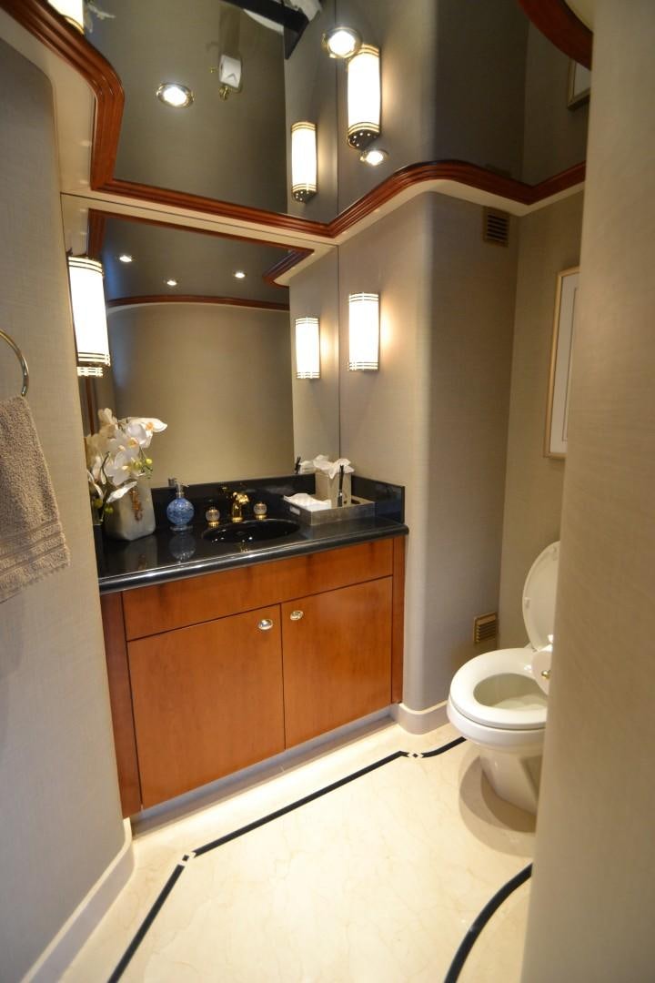 a bathroom with a sink and toilet aboard REBELLIOUS Yacht for Sale