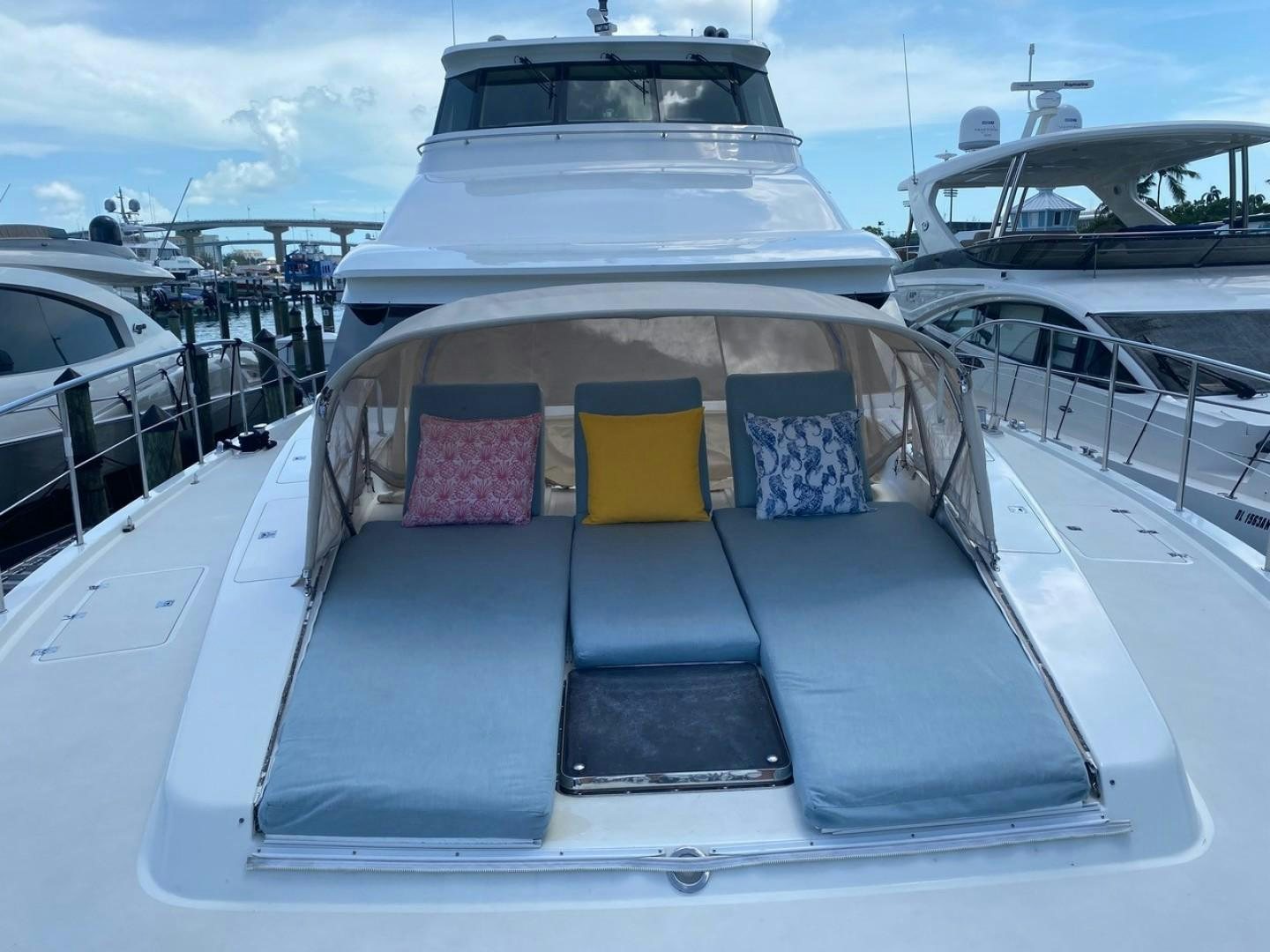 a boat with a seat on the deck aboard EQUINOX X Yacht for Sale