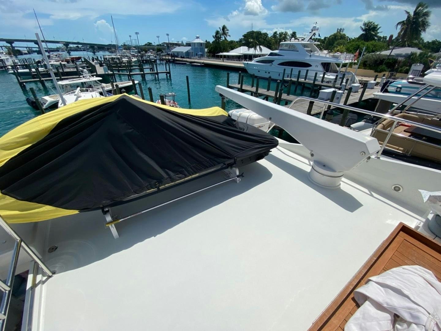 a boat docked at a pier aboard EQUINOX X Yacht for Sale