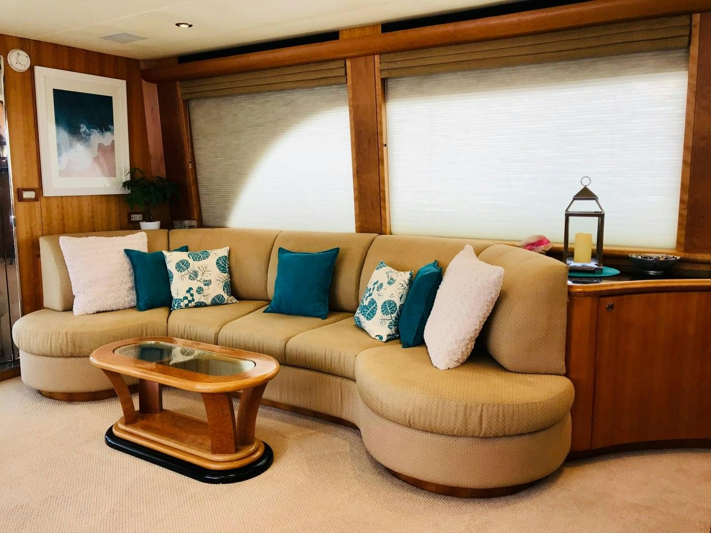 a couch with pillows on it aboard EQUINOX X Yacht for Sale
