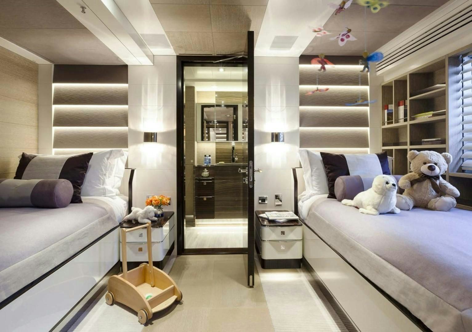 a bedroom with a bed and a desk aboard ASYA Yacht for Sale