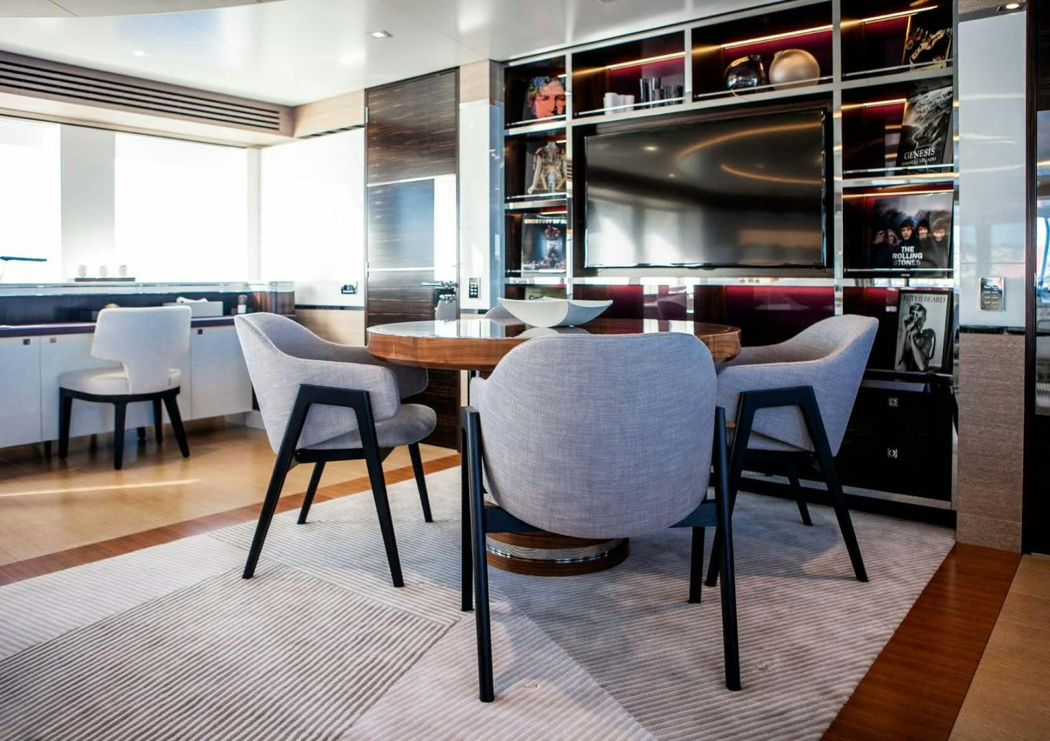 a dining room with a table and chairs aboard ASYA Yacht for Sale