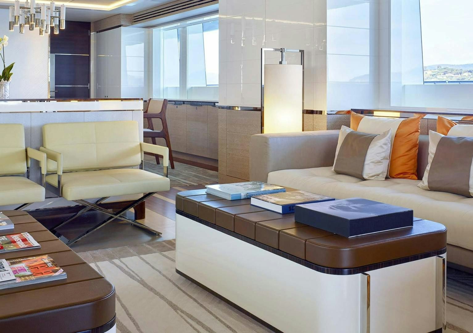 a living room with a couch and a coffee table aboard ASYA Yacht for Sale