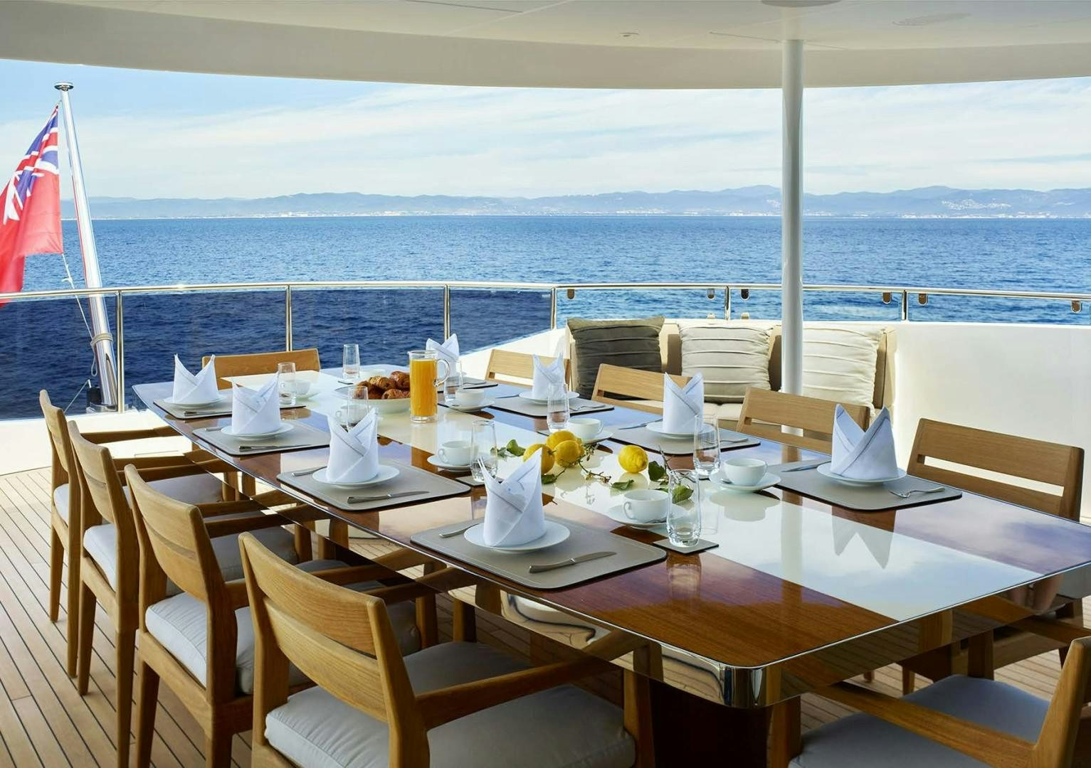 a table set for a dinner aboard ASYA Yacht for Sale