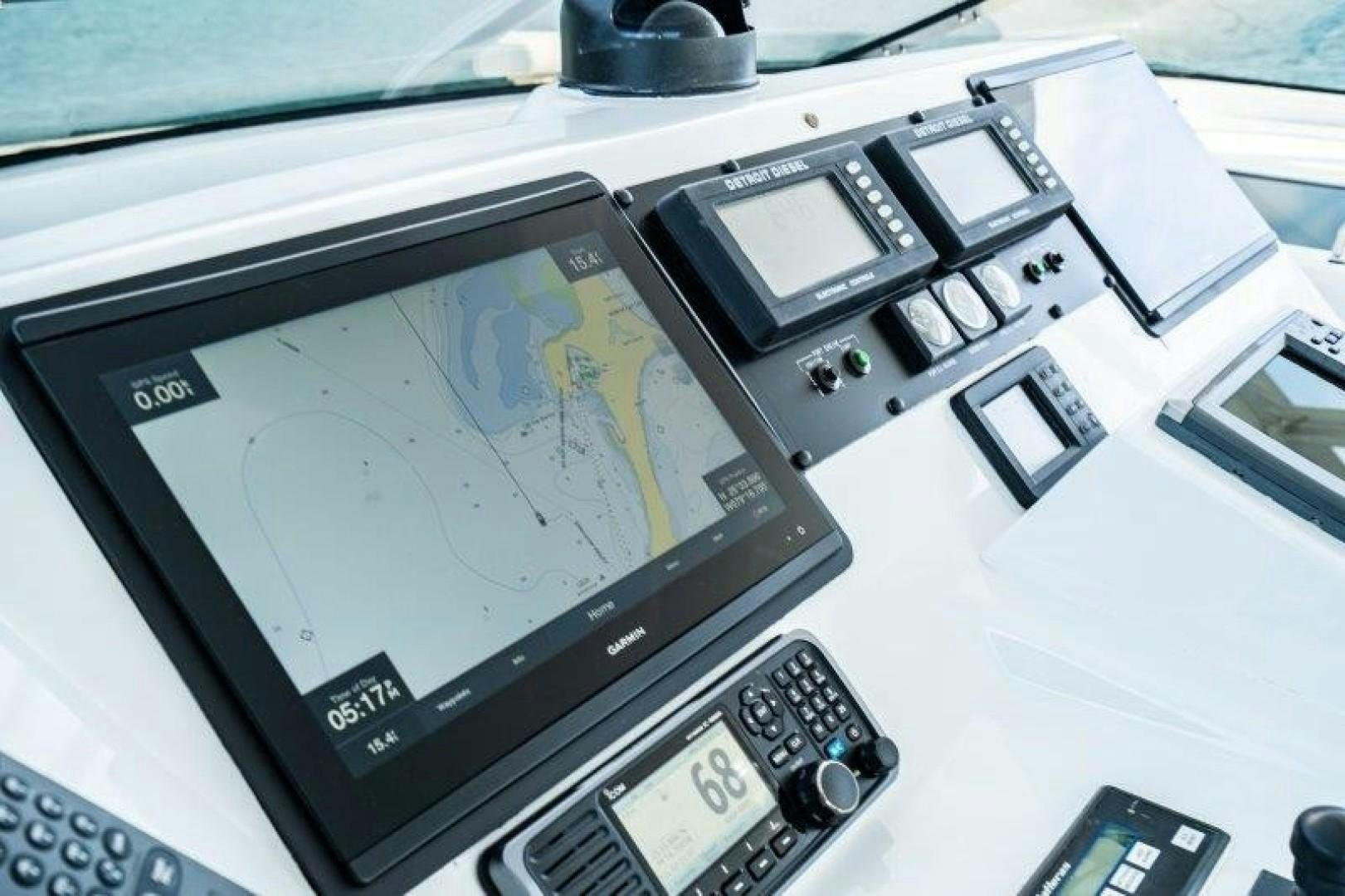 a tablet on a table aboard CENTODUE Yacht for Sale