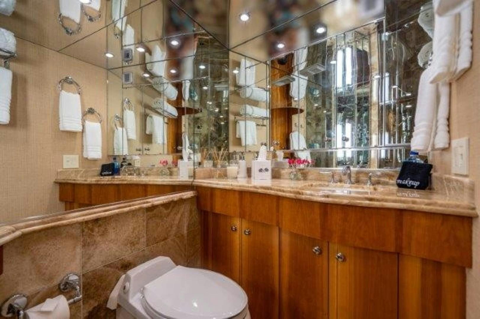 a bathroom with a sink and toilet aboard CENTODUE Yacht for Sale