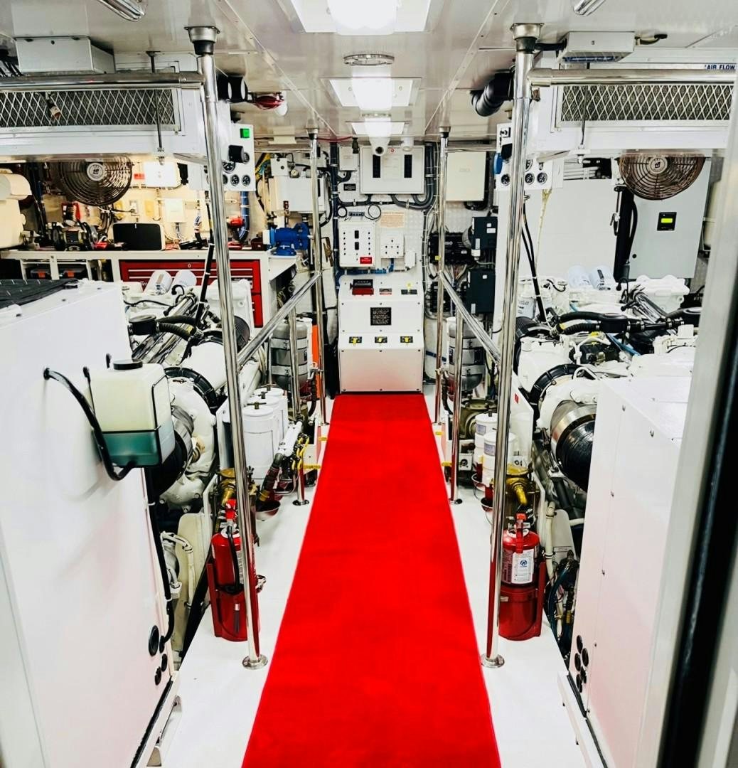 a red carpet in a room aboard CENTODUE Yacht for Sale