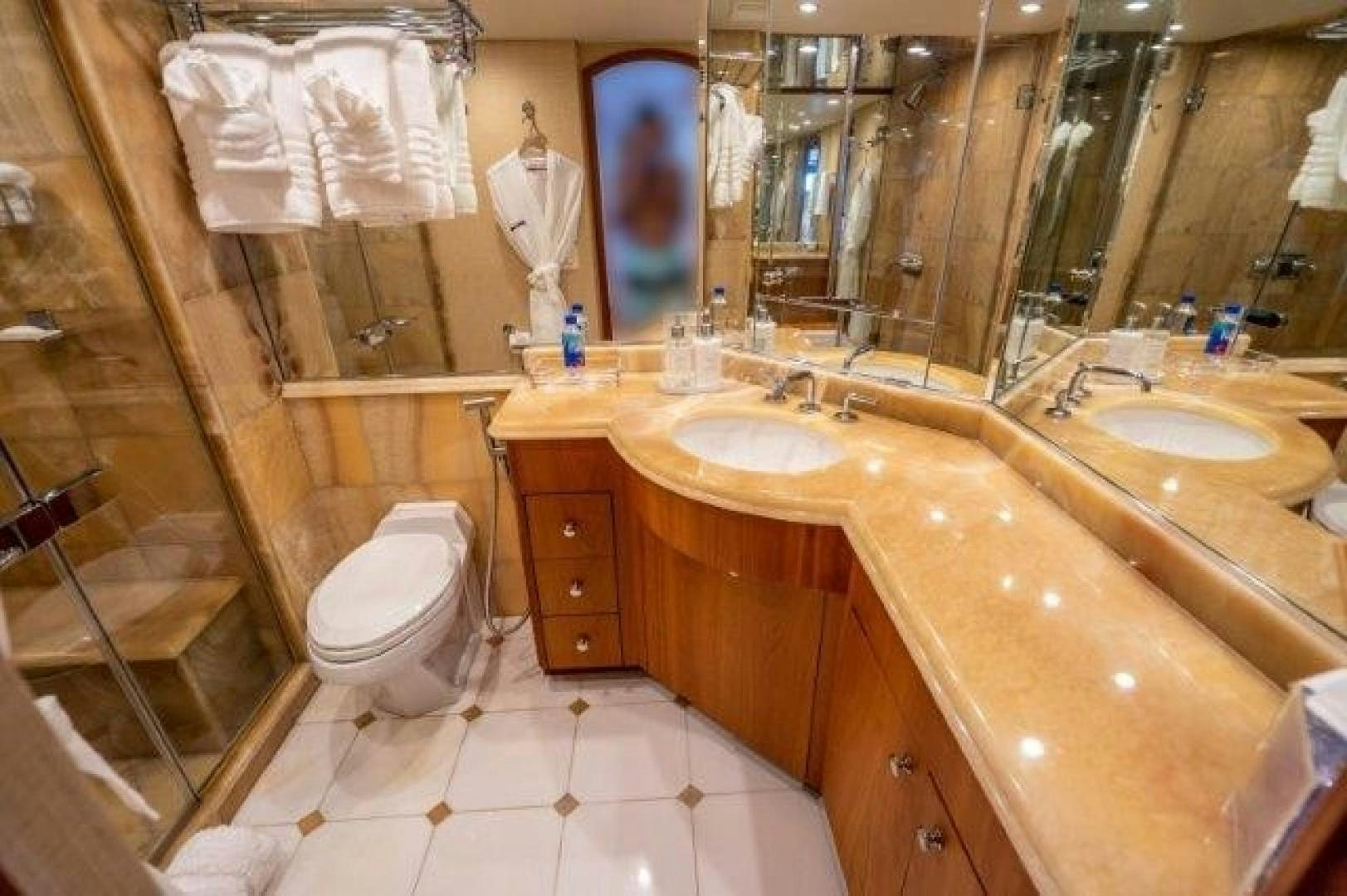 a bathroom with a sink and a toilet aboard CENTODUE Yacht for Sale