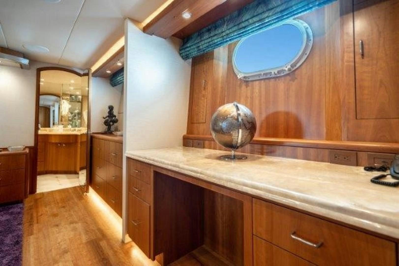 a kitchen with a marbled top aboard CENTODUE Yacht for Sale