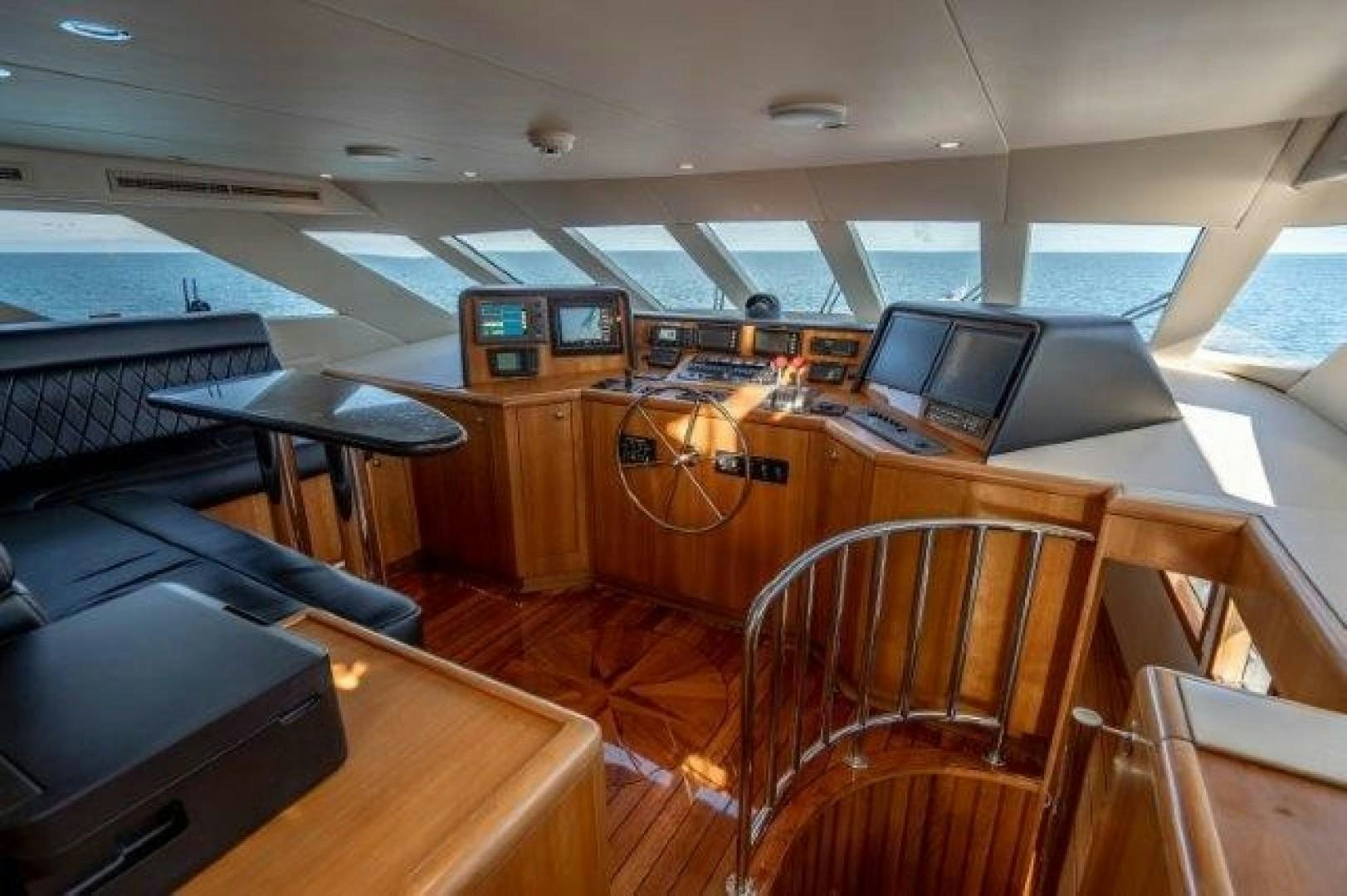 a room with desks and computers aboard CENTODUE Yacht for Sale
