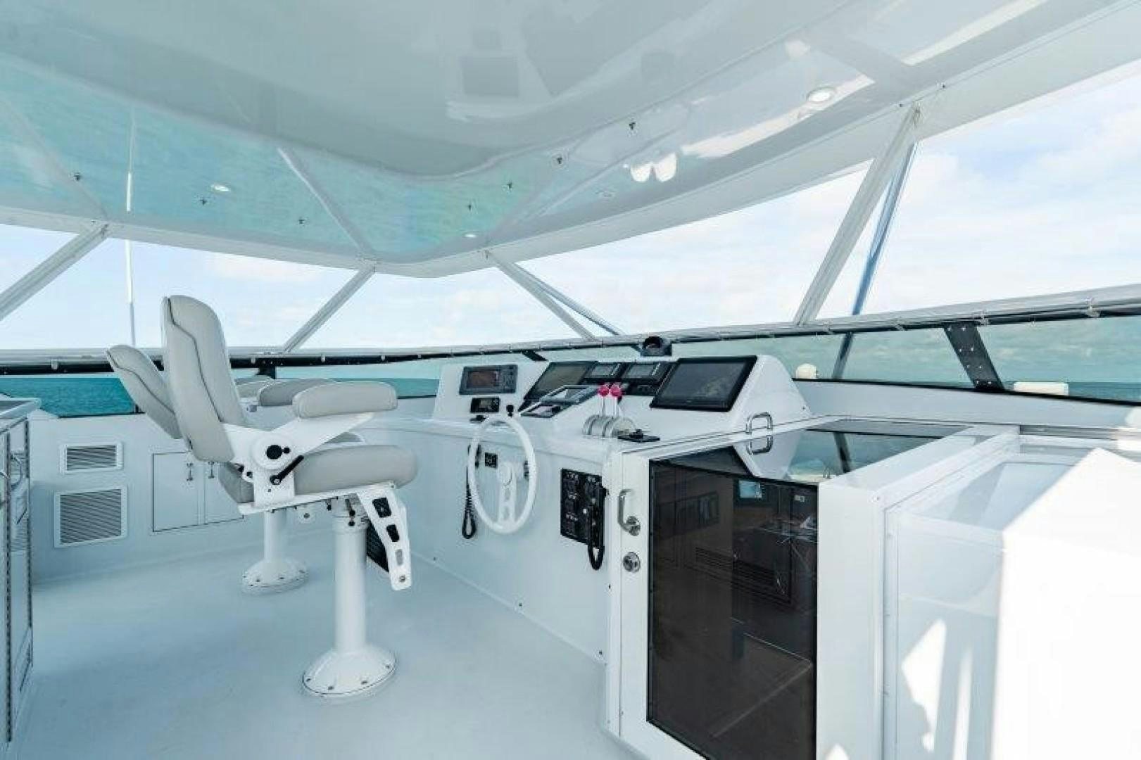 a white airplane in a room aboard CENTODUE Yacht for Sale