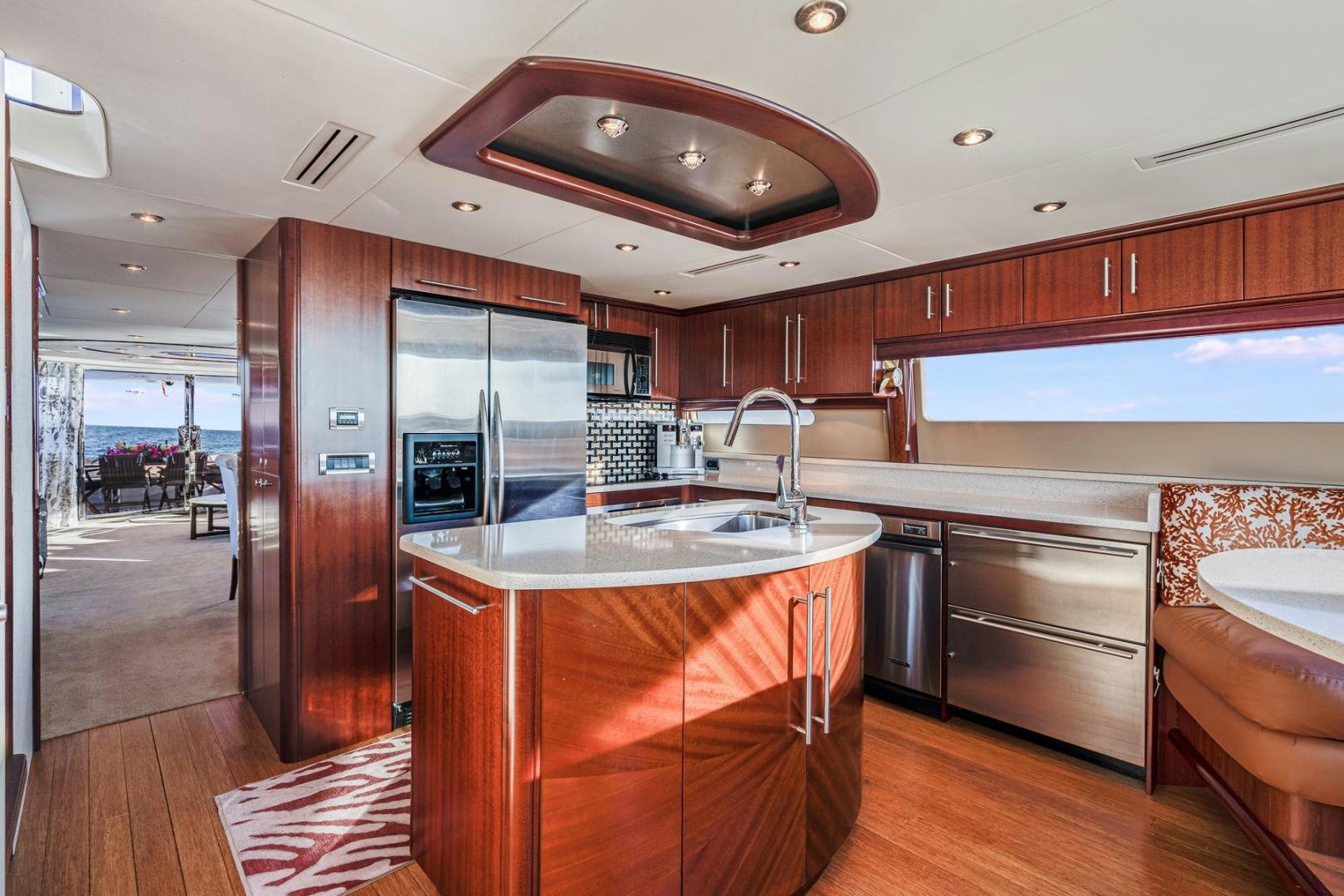 a kitchen with wooden cabinets aboard SUMMERWIND Yacht for Sale