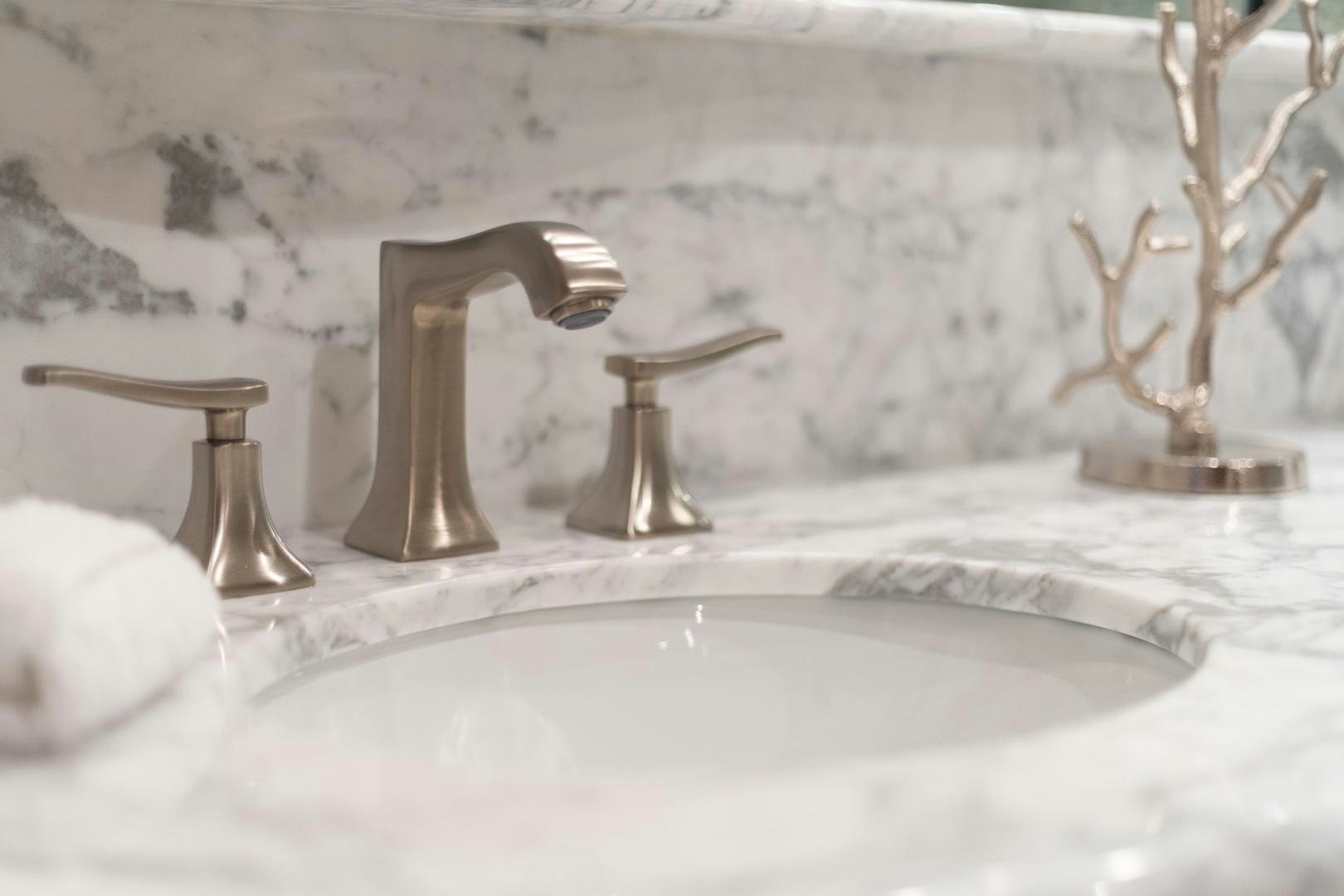 a bathroom sink with faucets aboard SUMMERWIND Yacht for Sale