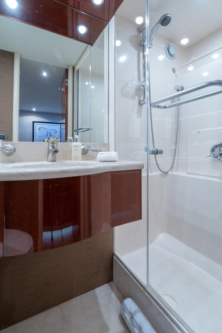 a bathroom with a shower and sink aboard SUMMERWIND Yacht for Sale