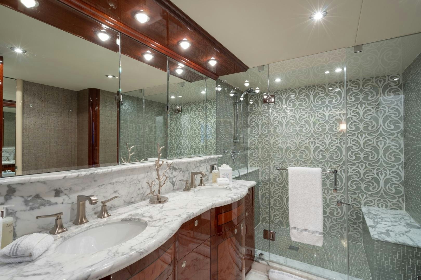 a bathroom with a large mirror aboard SUMMERWIND Yacht for Sale