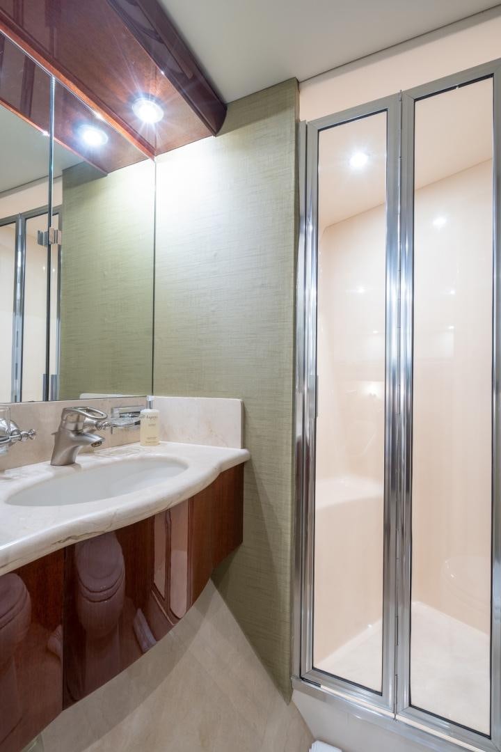 a bathroom with a sink and a shower aboard SUMMERWIND Yacht for Sale