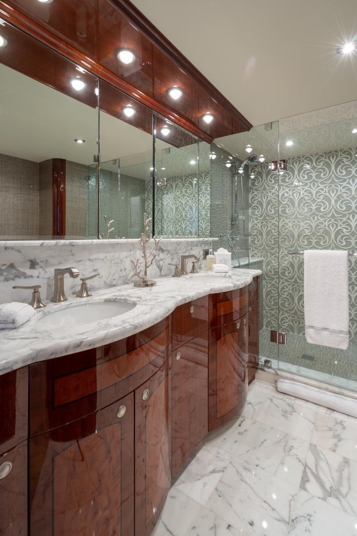 a bathroom with a large mirror aboard SUMMERWIND Yacht for Sale