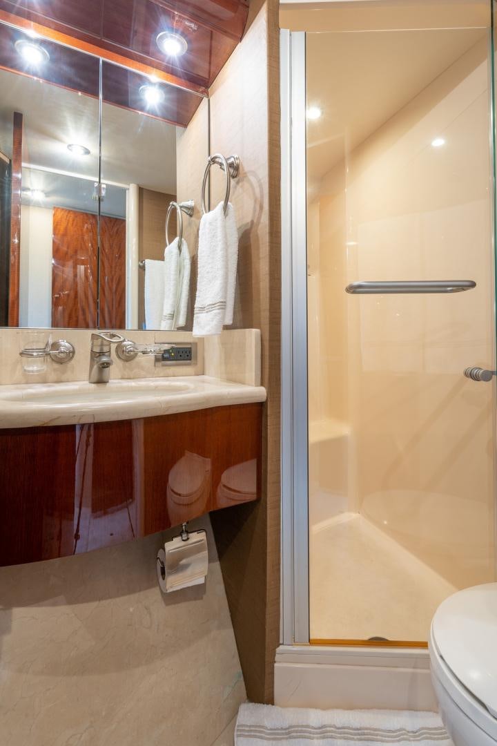 a bathroom with a sink and a shower aboard SUMMERWIND Yacht for Sale