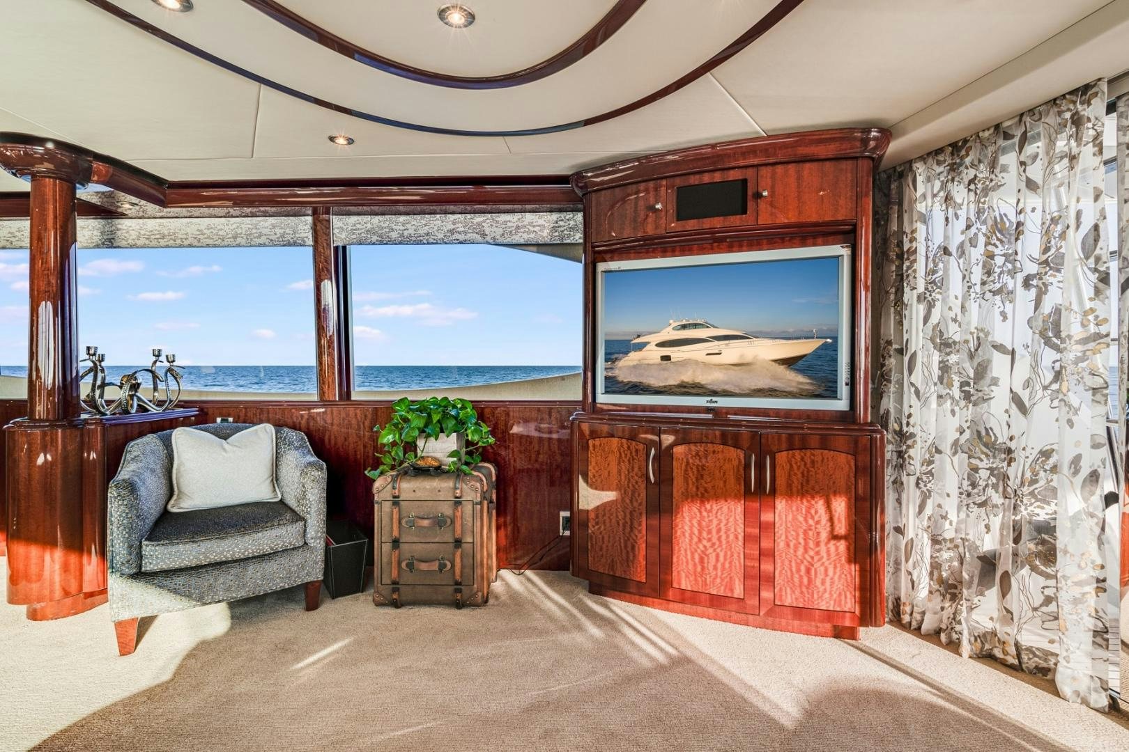 a room with a couch and a tv aboard SUMMERWIND Yacht for Sale