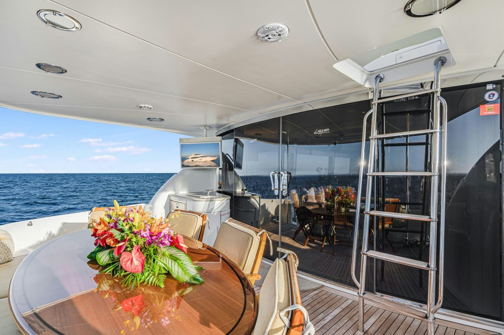 a room with a table and chairs aboard SUMMERWIND Yacht for Sale
