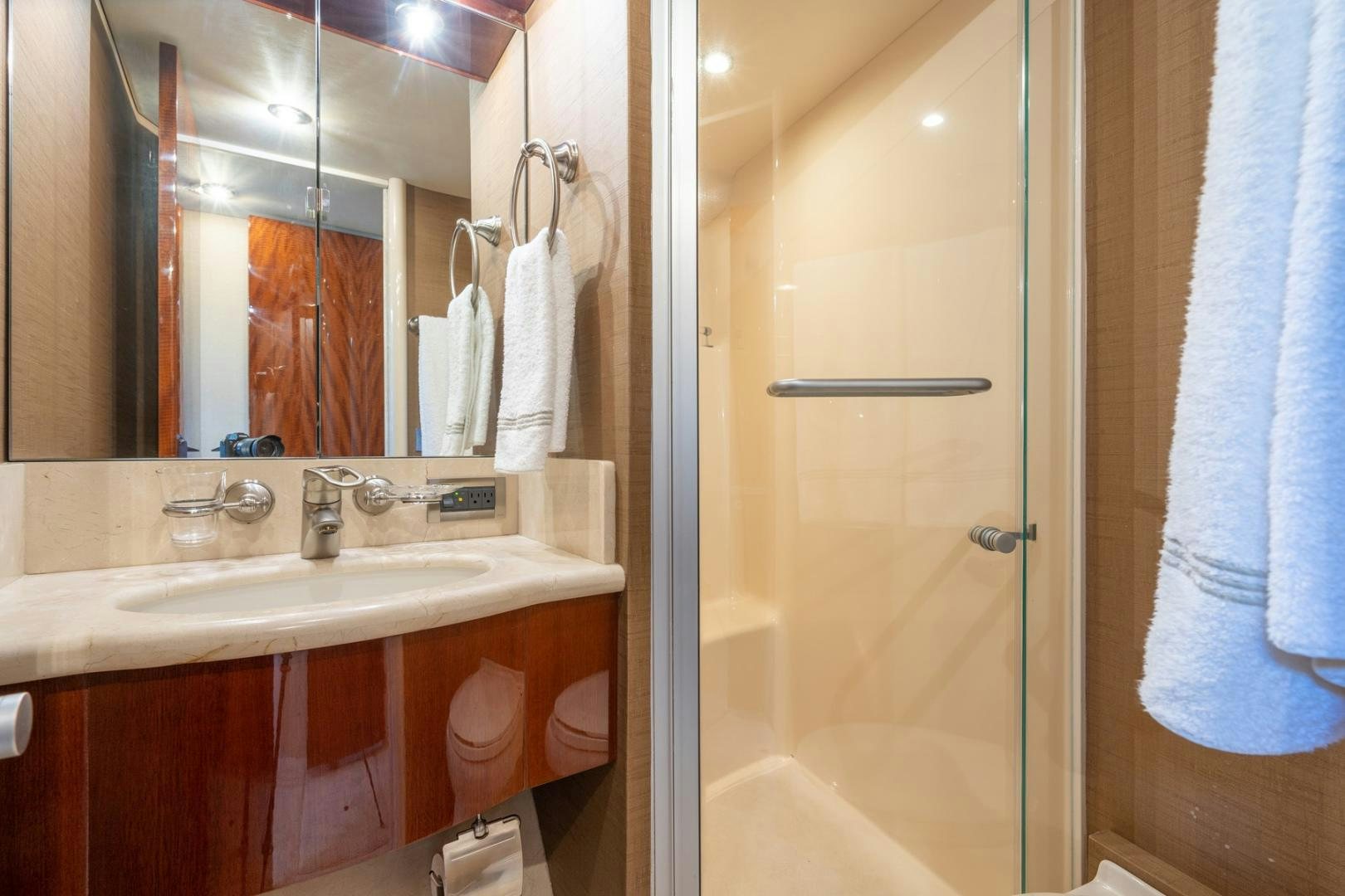 a bathroom with a sink and a mirror aboard SUMMERWIND Yacht for Sale