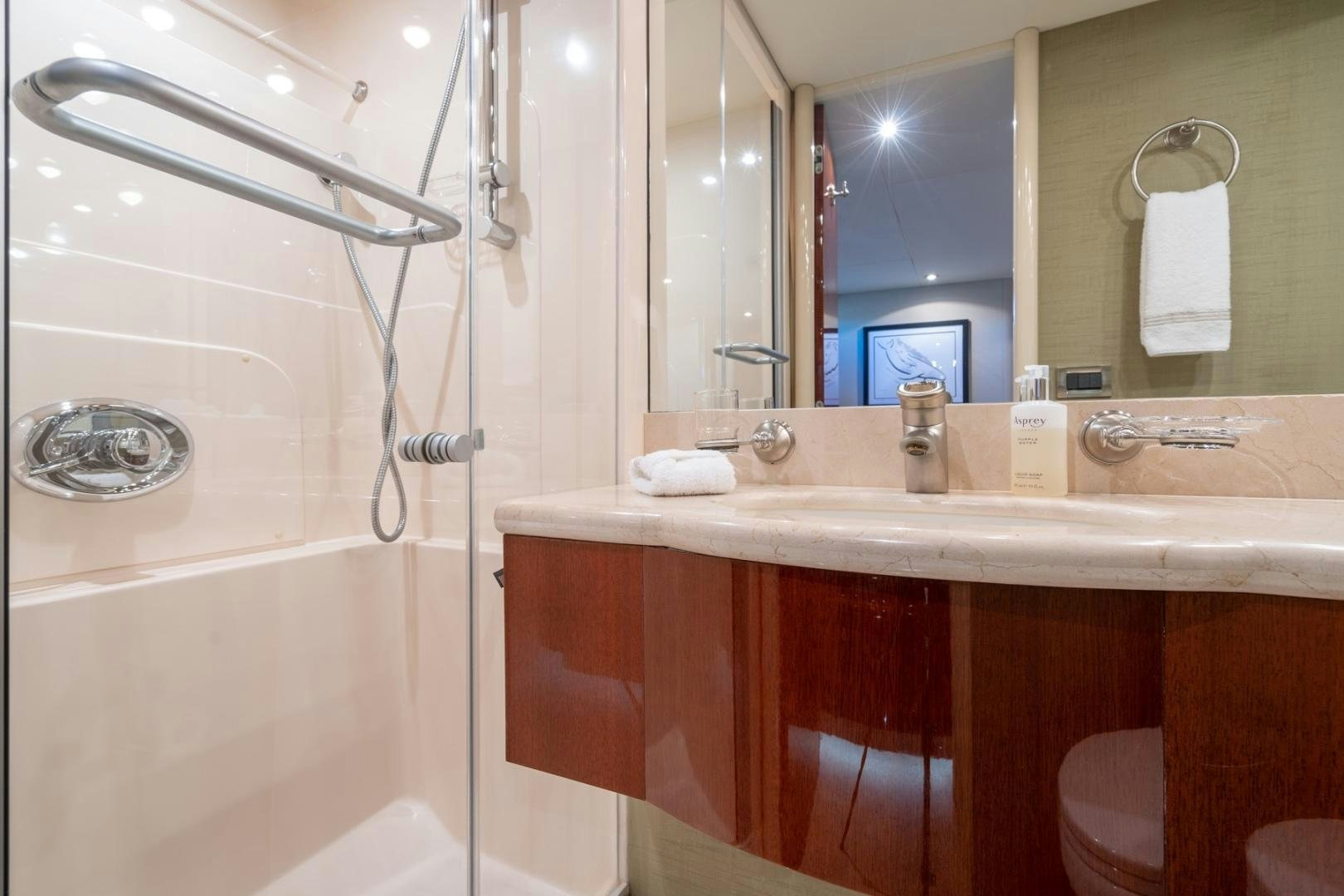 a bathroom with a shower and sink aboard SUMMERWIND Yacht for Sale