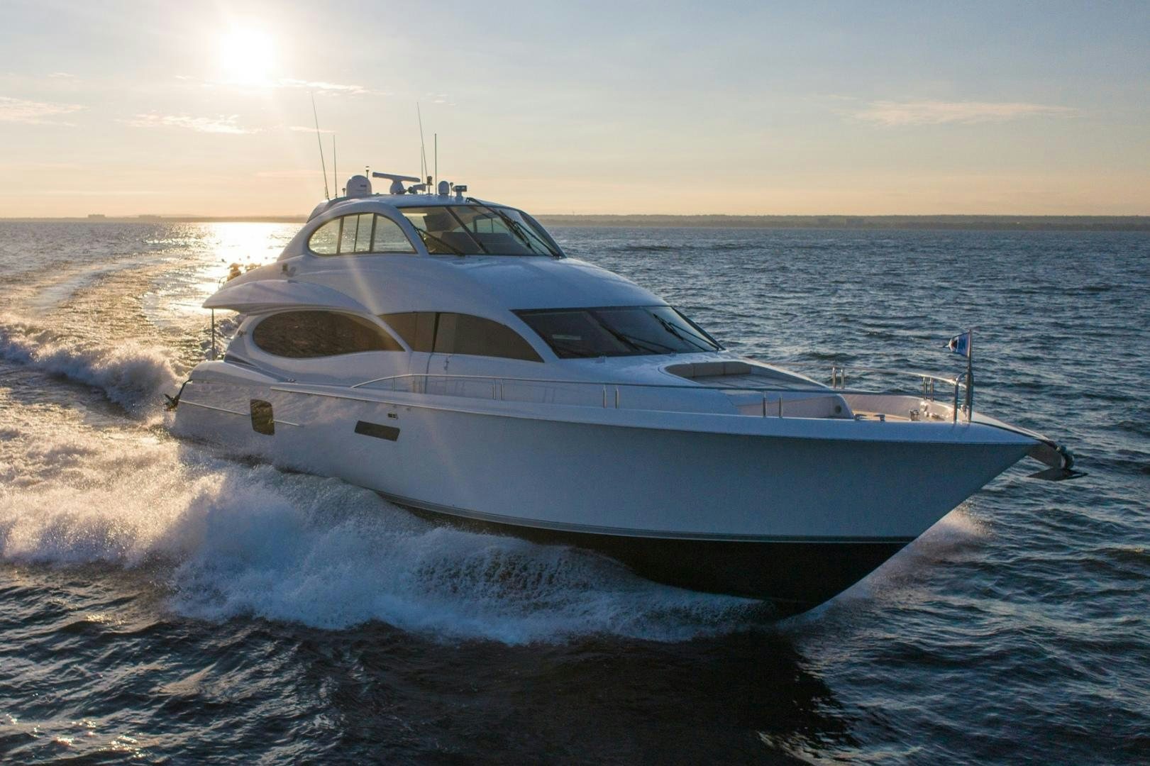 a white yacht splashing in the ocean aboard SUMMERWIND Yacht for Sale