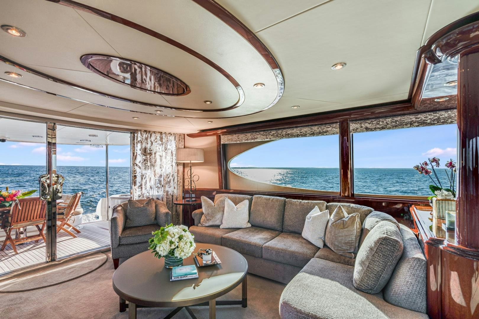 a living room with a large window aboard SUMMERWIND Yacht for Sale
