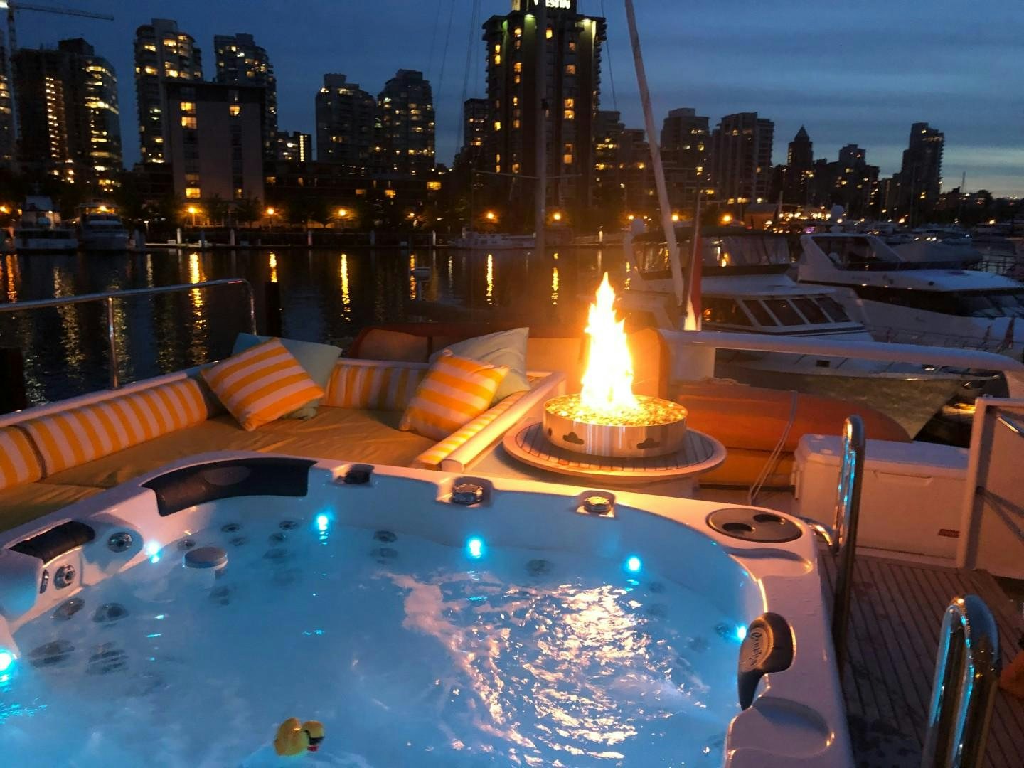 a pool with a fire in it aboard SOVEREIGN LADY Yacht for Sale
