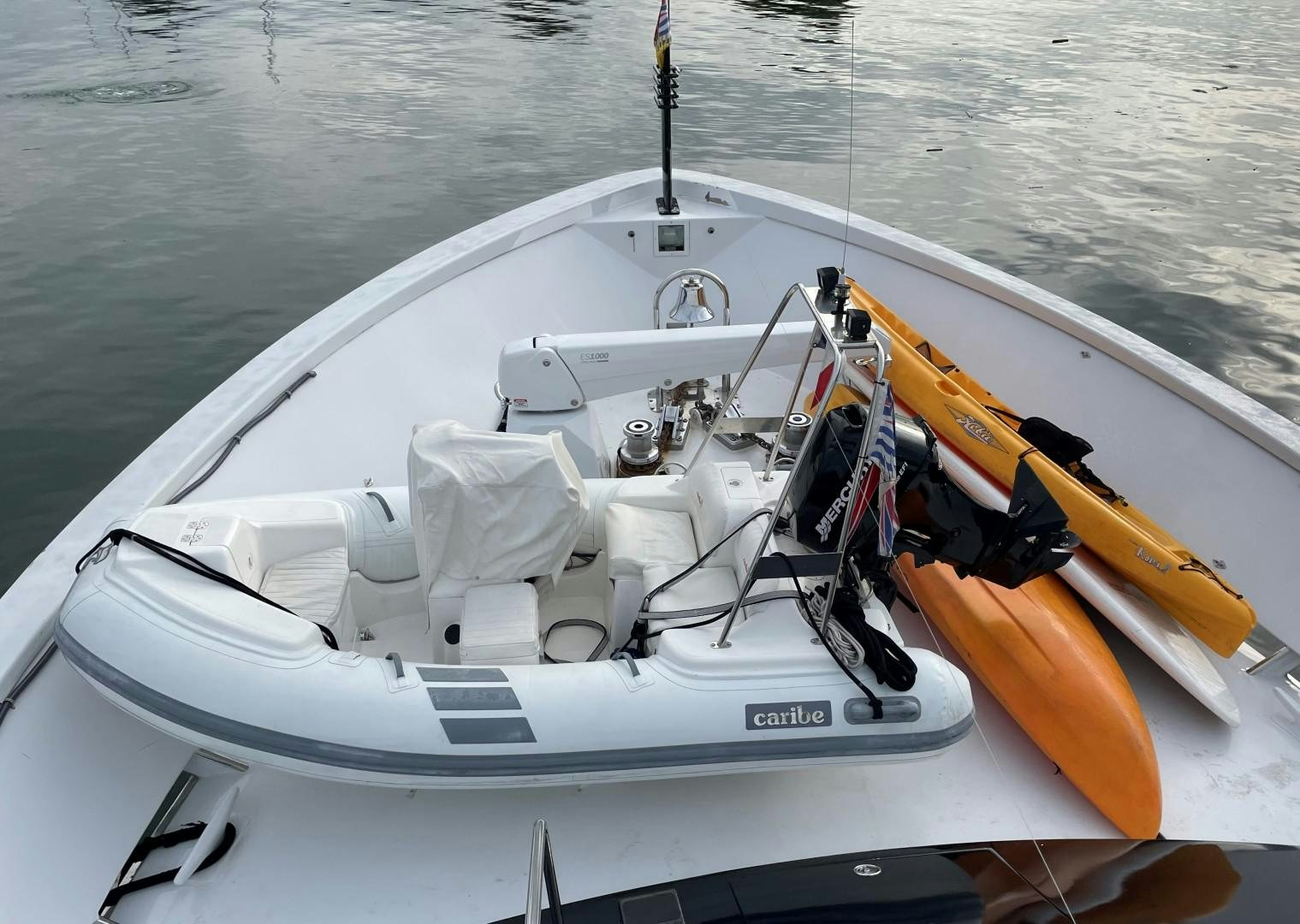 a white boat with a yellow life vest on it aboard SOVEREIGN LADY Yacht for Sale