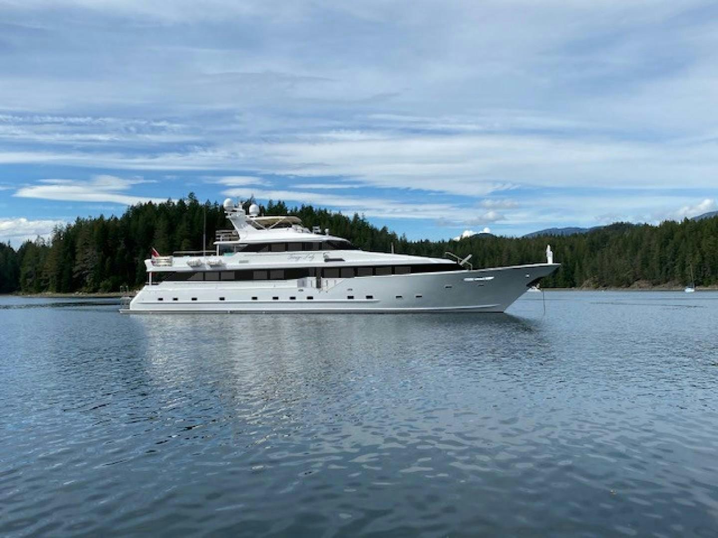 a large white yacht on the water aboard SOVEREIGN LADY Yacht for Sale