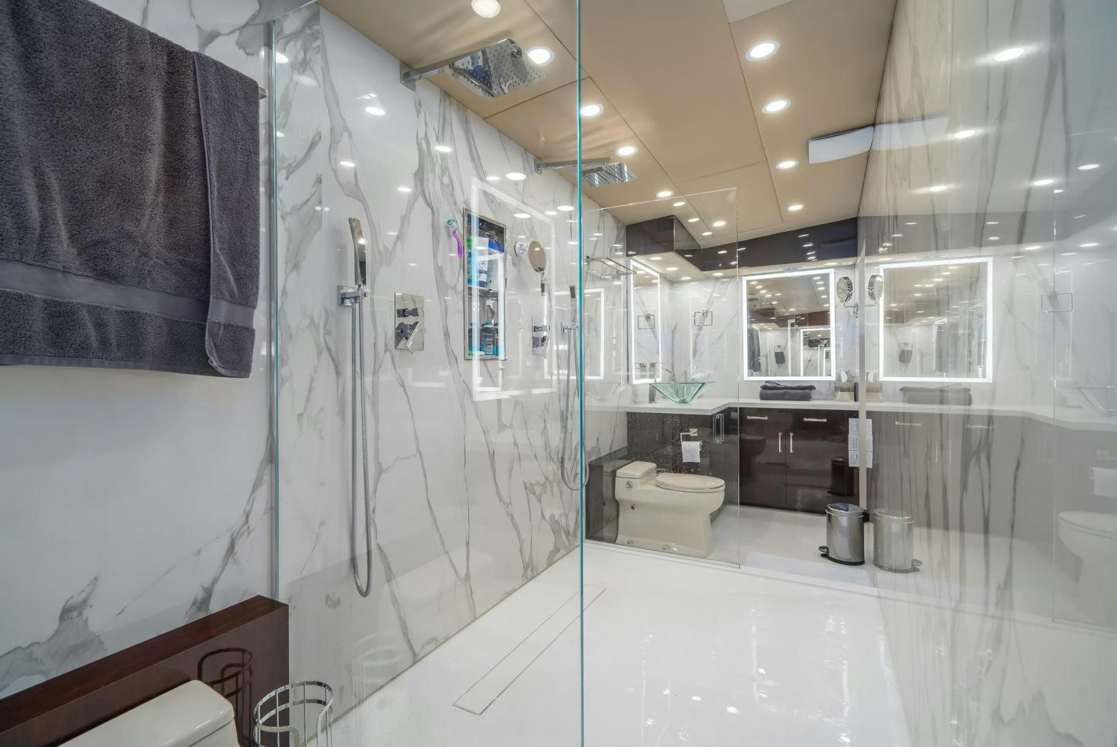 a bathroom with a large shower aboard SOVEREIGN LADY Yacht for Sale