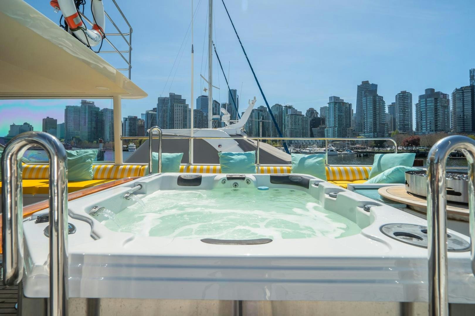 a boat with a city in the background aboard SOVEREIGN LADY Yacht for Sale