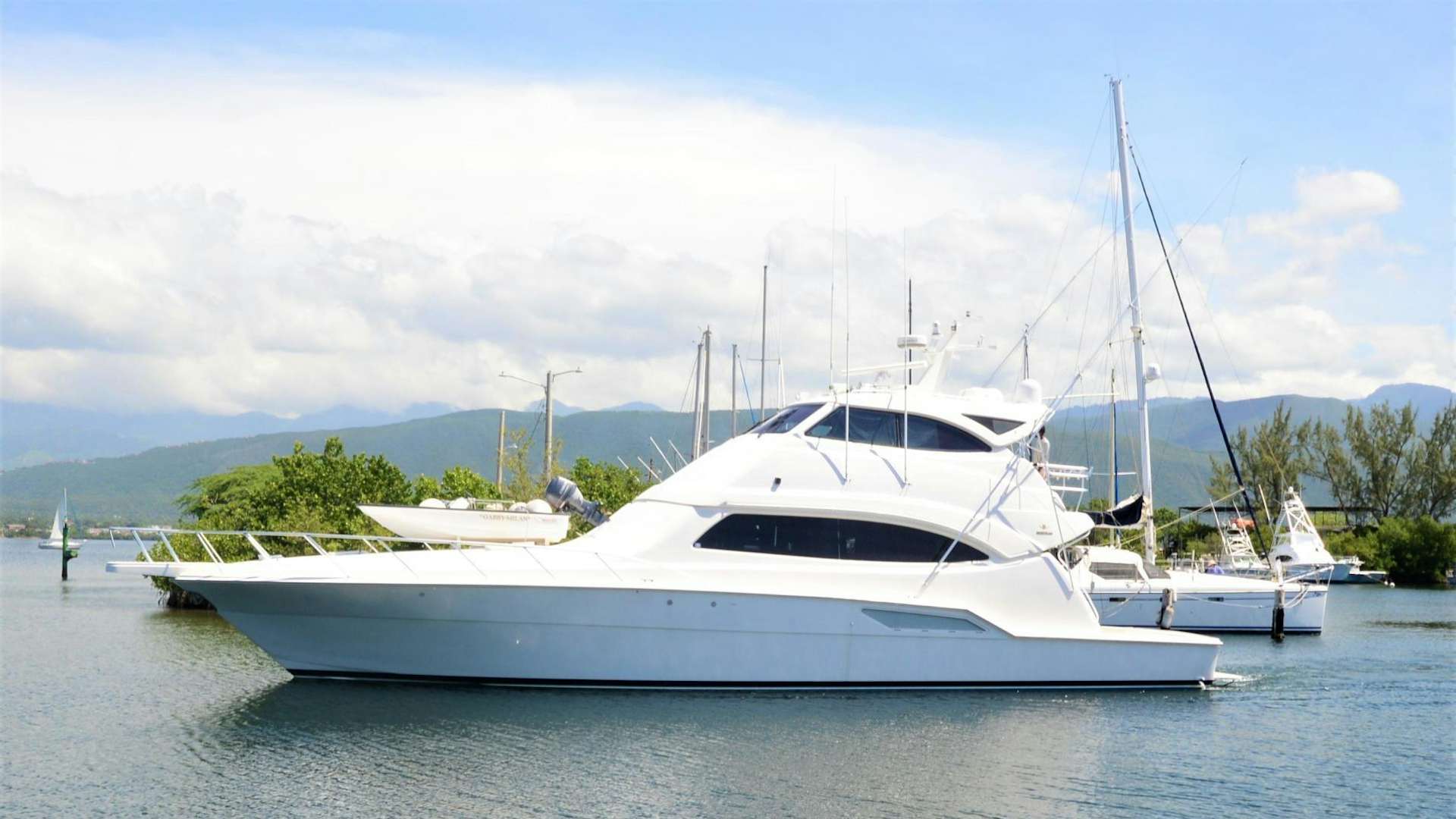 a white yacht in the water aboard GABBY MILAN 2 Yacht for Sale