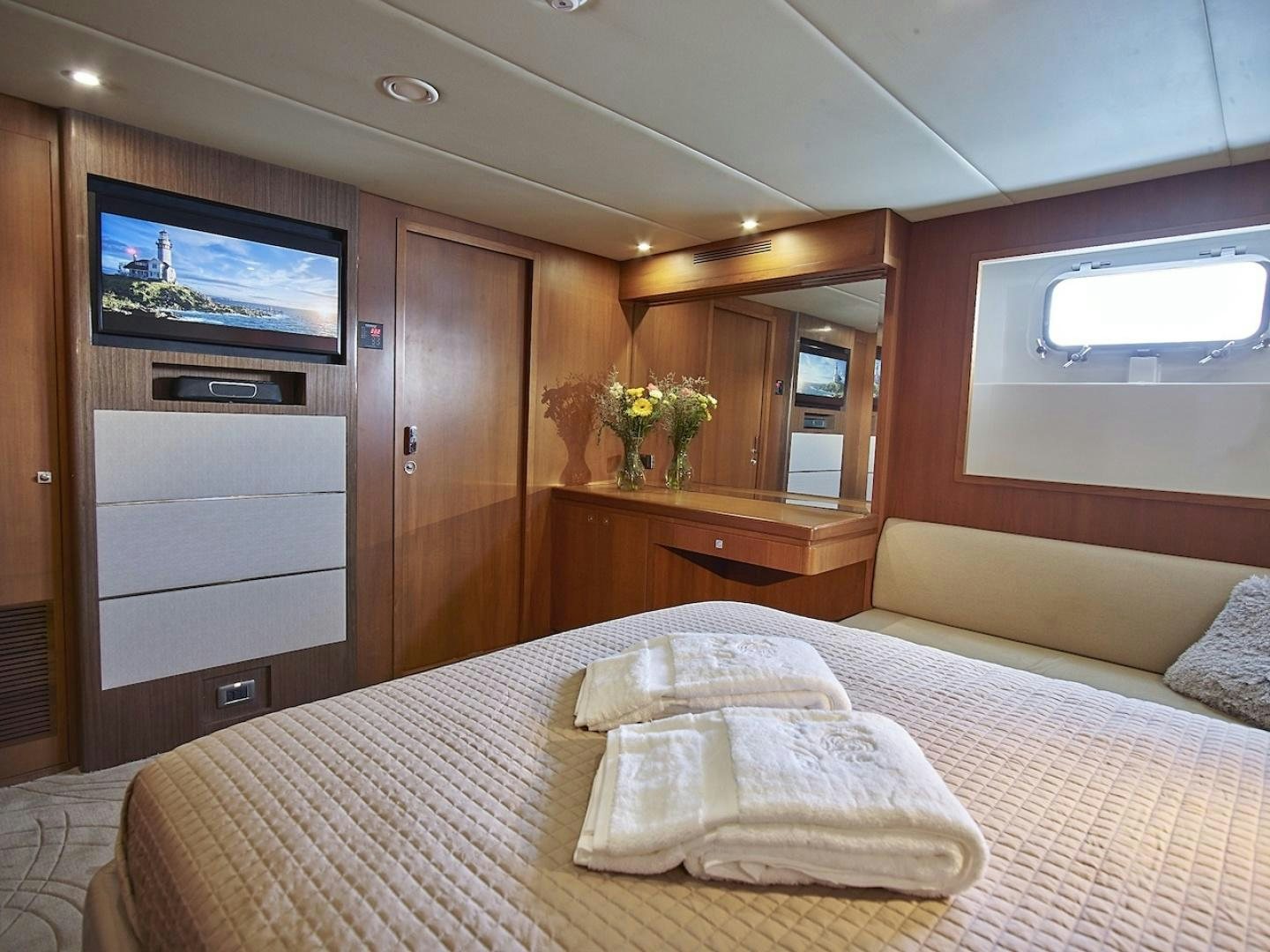 a bed in a room aboard ALAIA Yacht for Sale