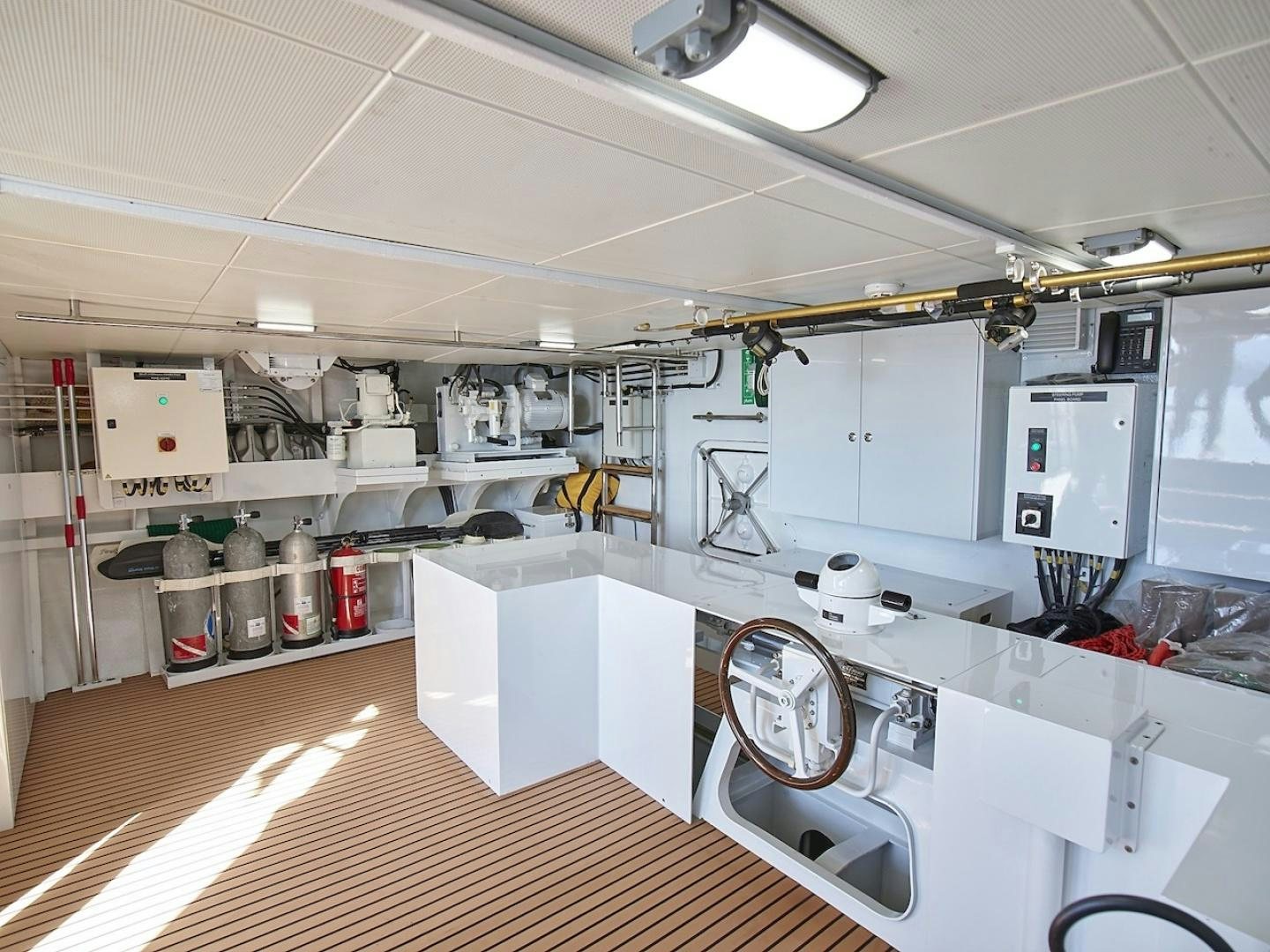 a large industrial kitchen aboard ALAIA Yacht for Sale