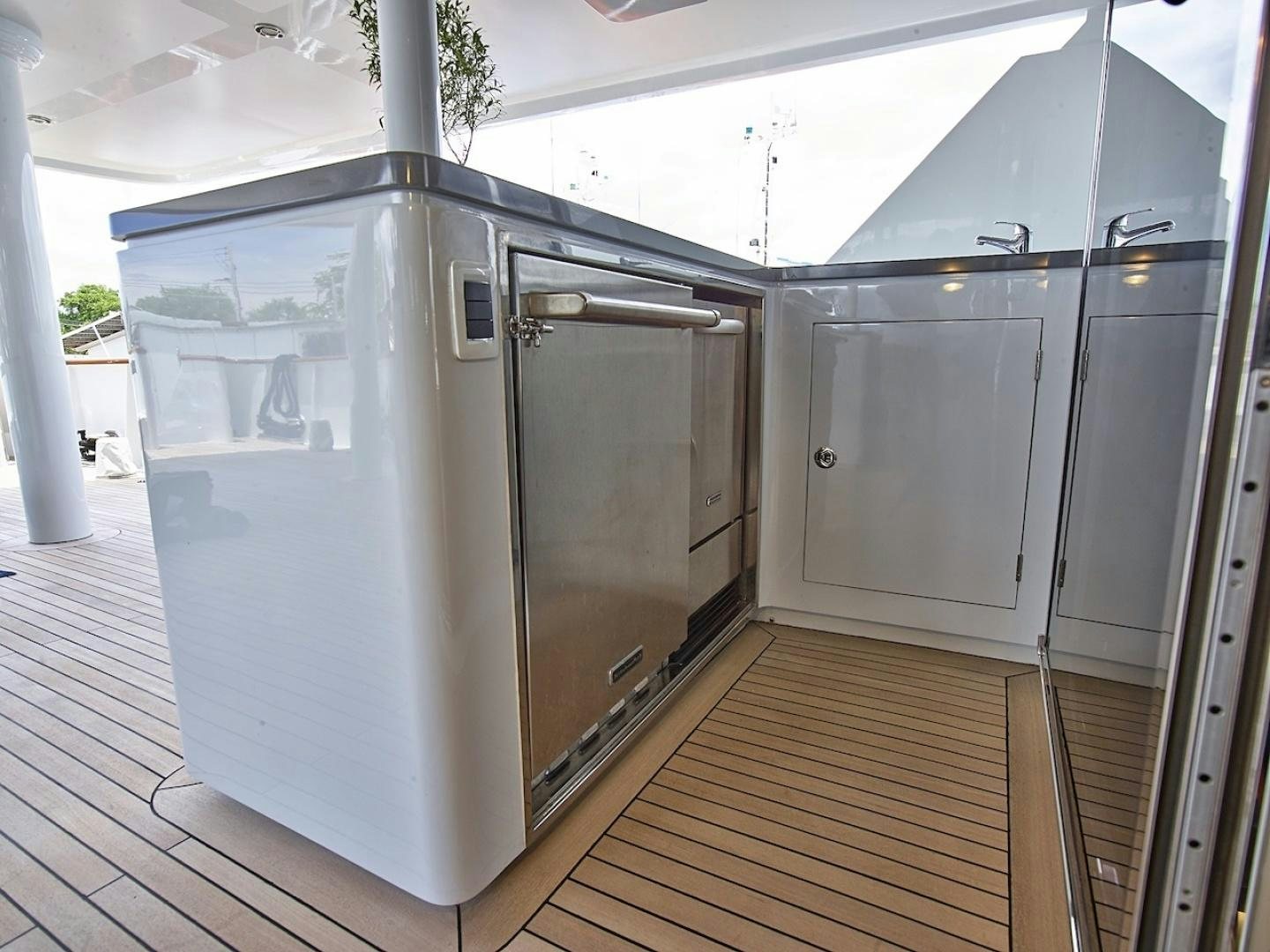 a large silver refrigerator aboard ALAIA Yacht for Sale
